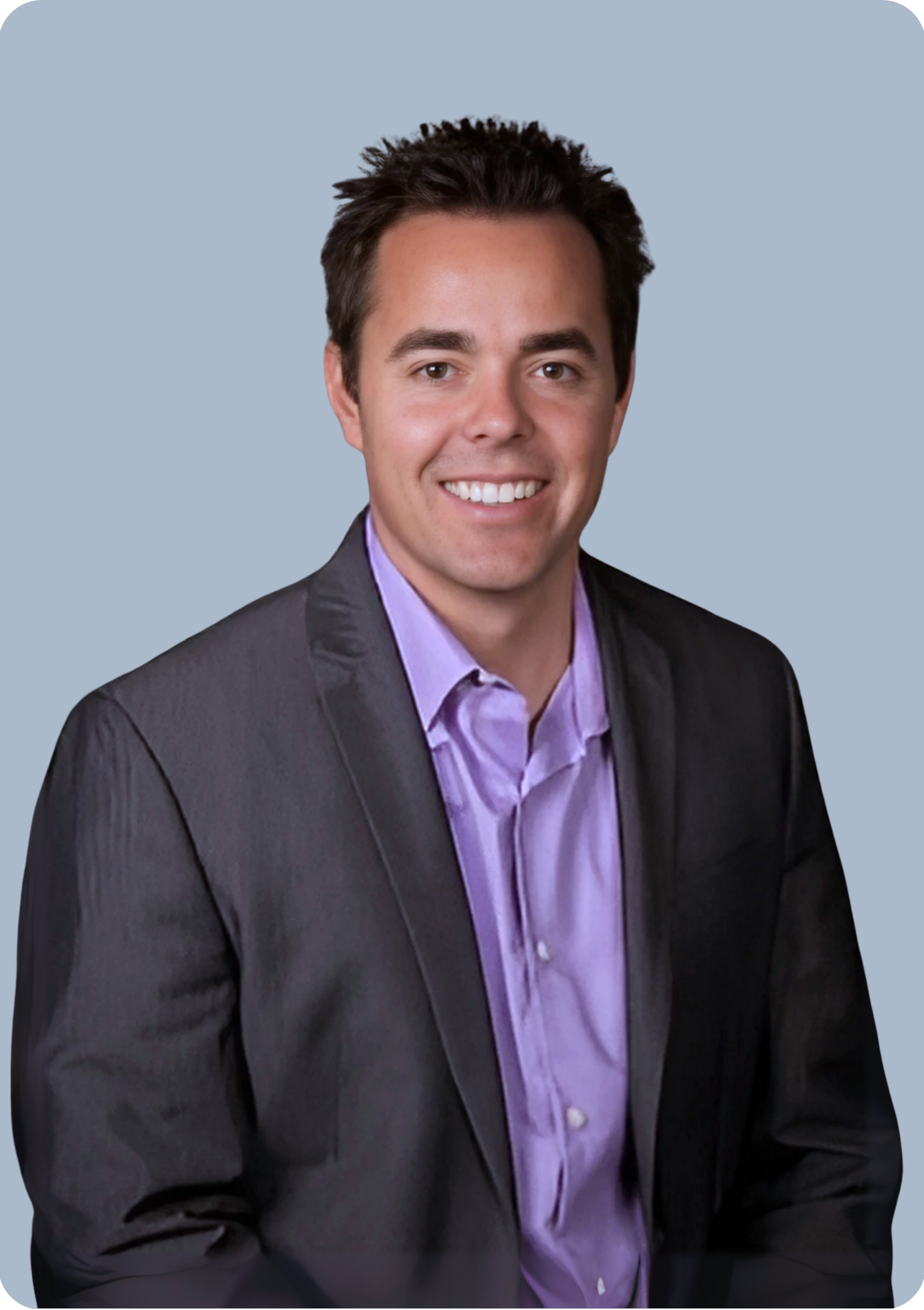 Middle aged businessman crossing arms