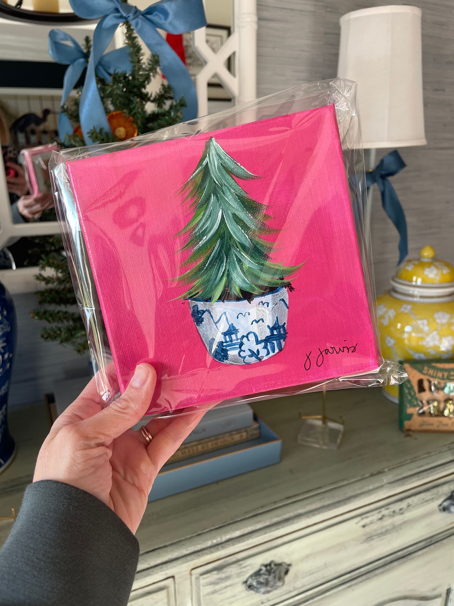 chinoiserie christmas tree painting on hot pink background