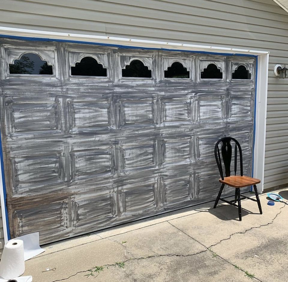 detached garage door with one coat of grey gel stain