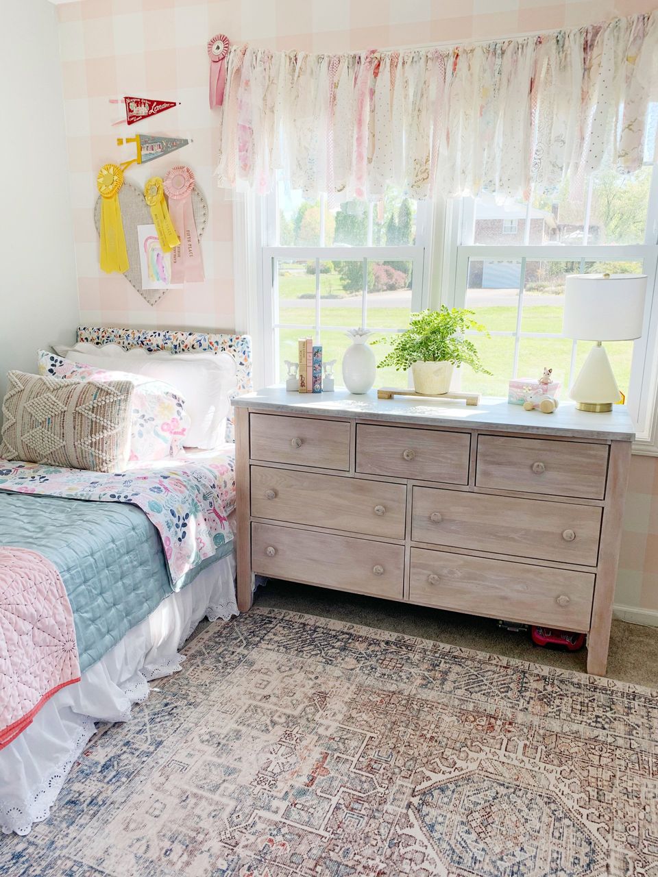 little girls room with white washed dresser