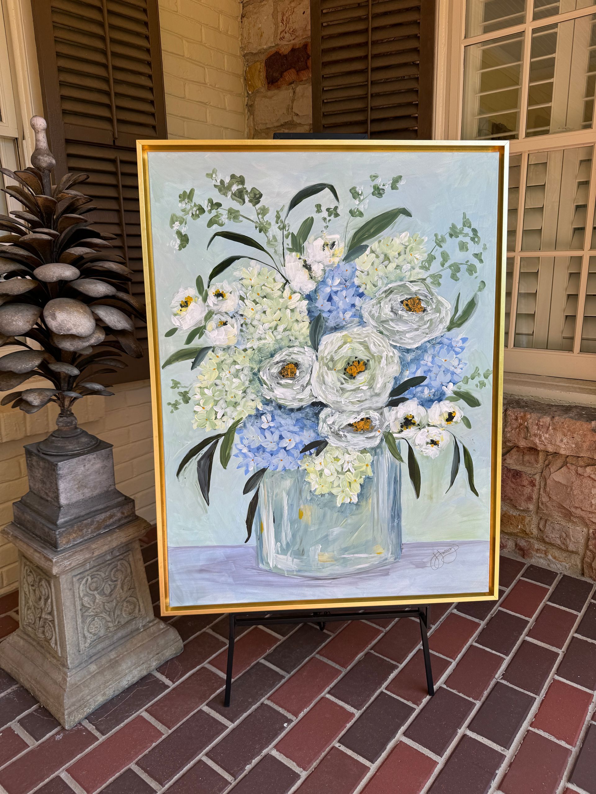 bold floral painting with white, blue and greens