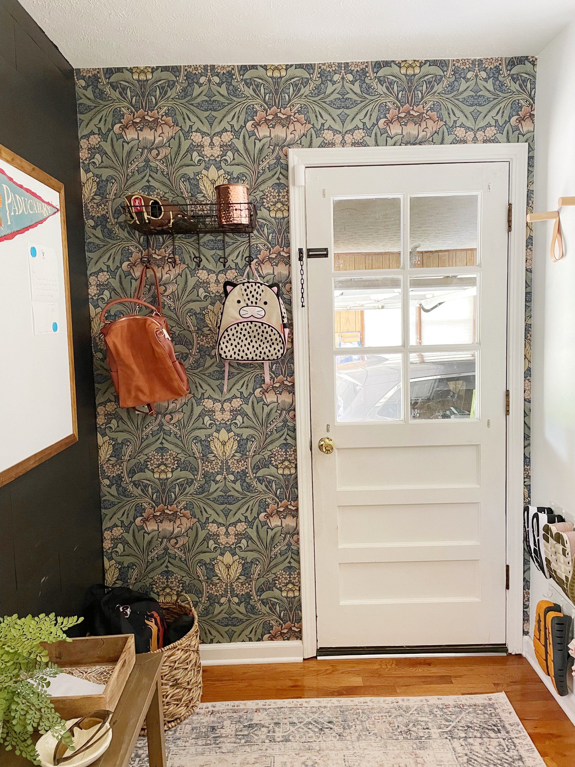 peel and stick wallpaper accent wall in laundry room