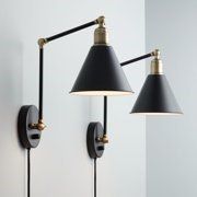 black and brass swing arm wall sconce