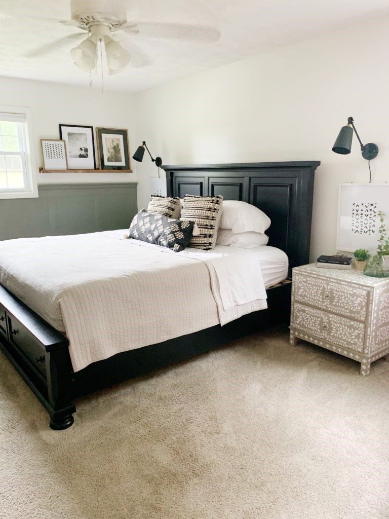 Sherwin Williams Alabaster is a creamy white on the master bedroom wall