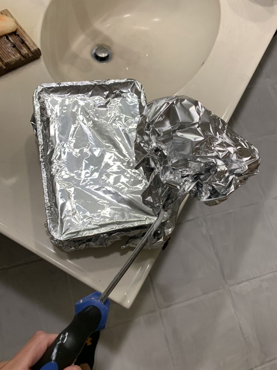 aluminum foil to cover paint and roller