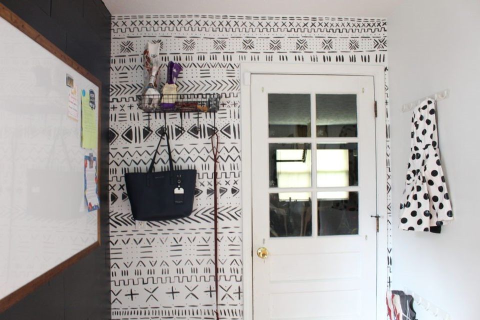 black and white mudcloth accent wall in laundry room