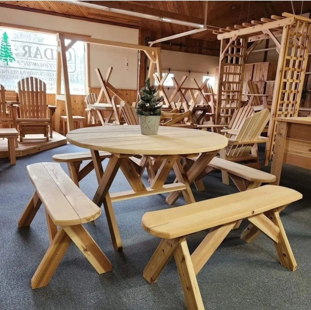 Three wooden chairs are sitting on a wooden floor.