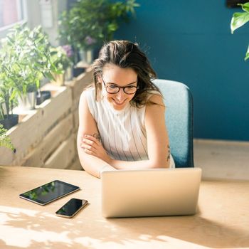 woman working on her laptop