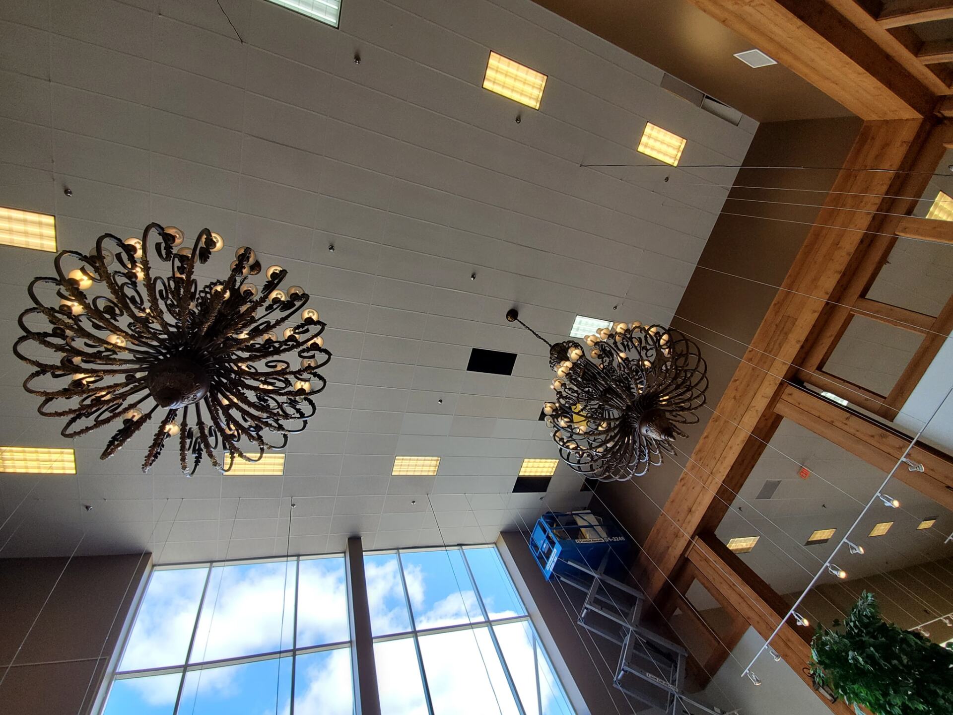 A ceiling with a lot of lights hanging from it