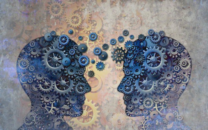 A Picture Of Heads Made With Gears — Downers Grove, IL — T. B. Kulat