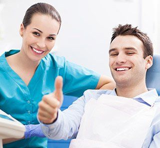 Man Giving Thumbs Up - Dental Procedures in Tyrone, PA