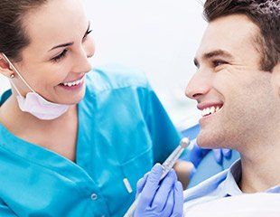 Female Dentist and Patient - Dental Office in Tyrone, PA