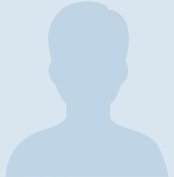 A silhouette of a man without a face on a blue background.