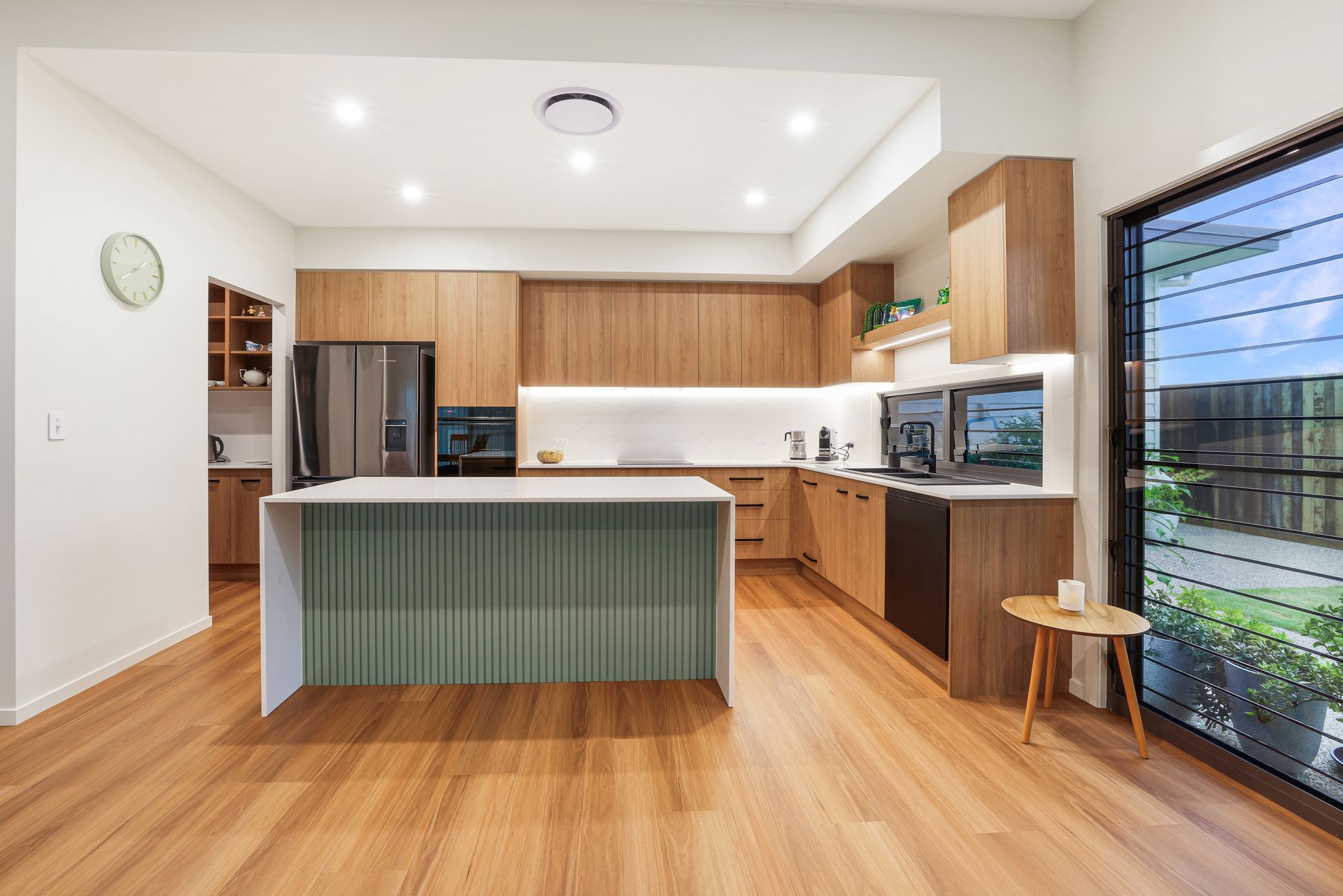 A Walk In Closet With Lots Of Shelves And Drawers — Master Cabinets Bundaberg in Kensington, QLD