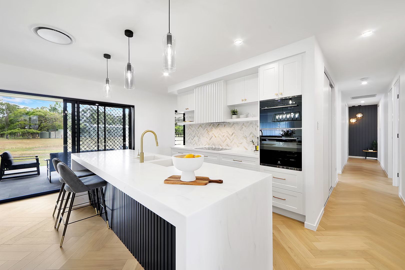 Kitchen Under Construction With White Cabinets, Countertops — Master Cabinets Bundaberg in Burnett Heads, QLD