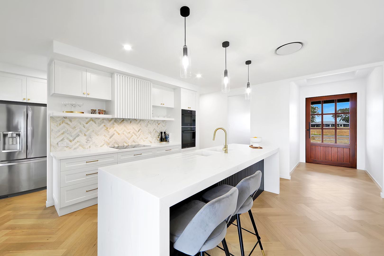 Modern Kitchen With Wooden Cabinets and White Countertops — Master Cabinets Bundaberg in Kensington, QLD