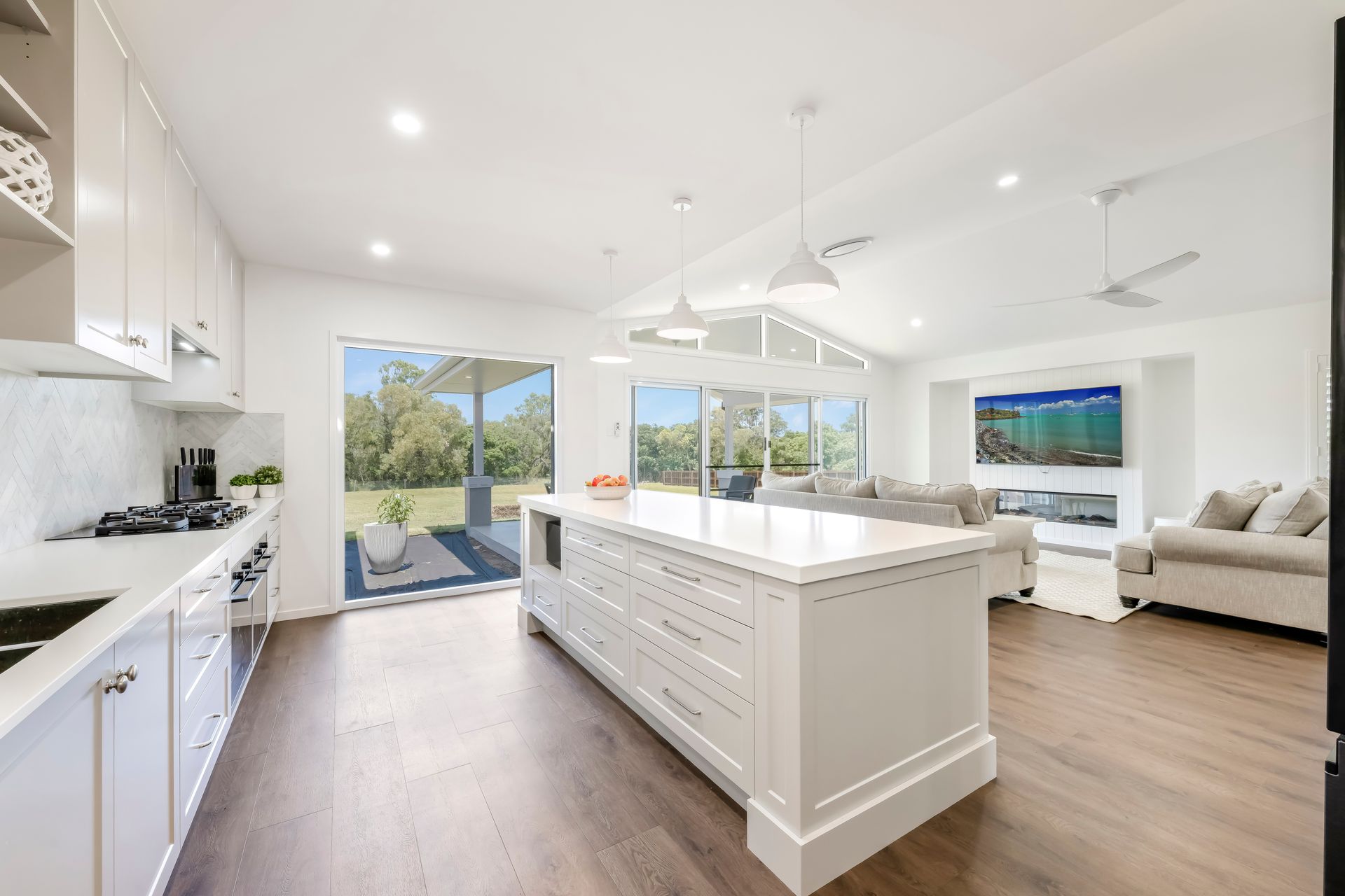 There Is A Large Island In The Middle Of The Kitchen — Master Cabinets Bundaberg in Kensington, QLD