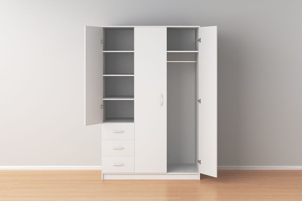 A White Wardrobe With The Doors Open In An Empty Room — Master Cabinets Bundaberg in Burrum Heads, QLD