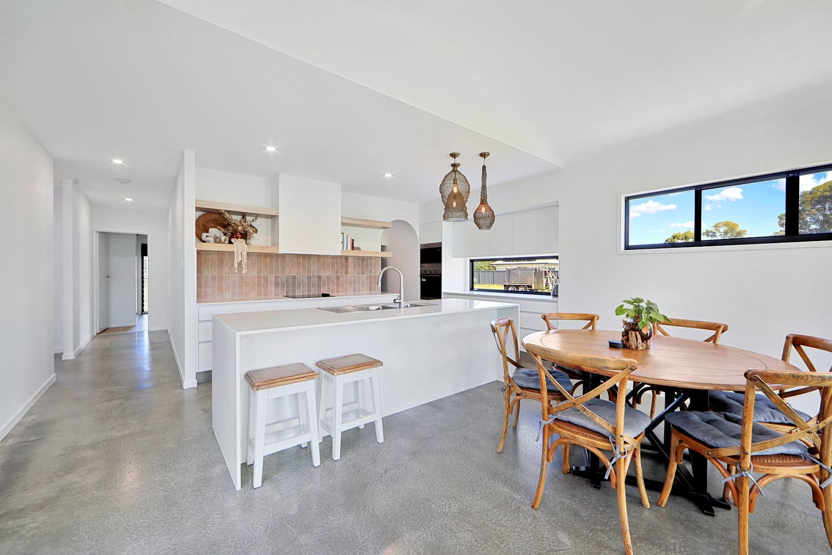 An Aerial View Of A River With Boats In It And A City In The Background — Master Cabinets Bundaberg in Kensington, QLD