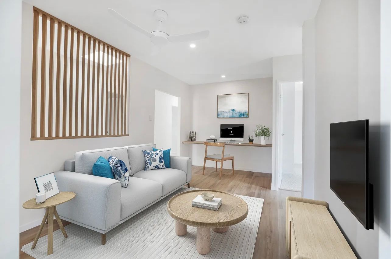 A Closet With Sliding Doors And A Refrigerator In It — Master Cabinets Bundaberg in Woodgate, QLD