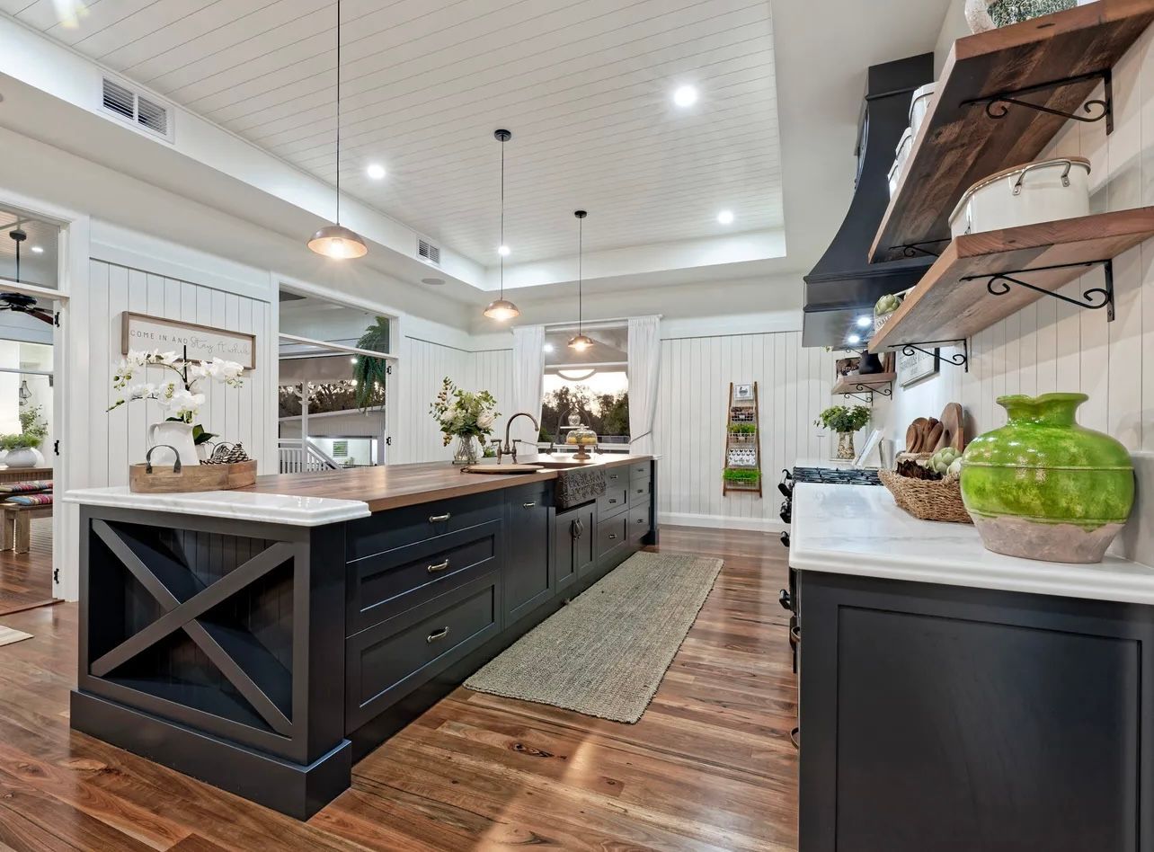 A Bathroom With Two Sinks And A Large Mirror — Master Cabinets Bundaberg in Kensington, QLD