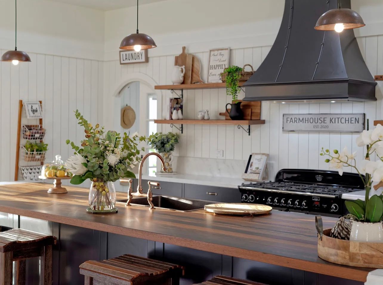 Modern White Kitchen With Floating Shelves — Master Cabinets Bundaberg in Kensington, QLD