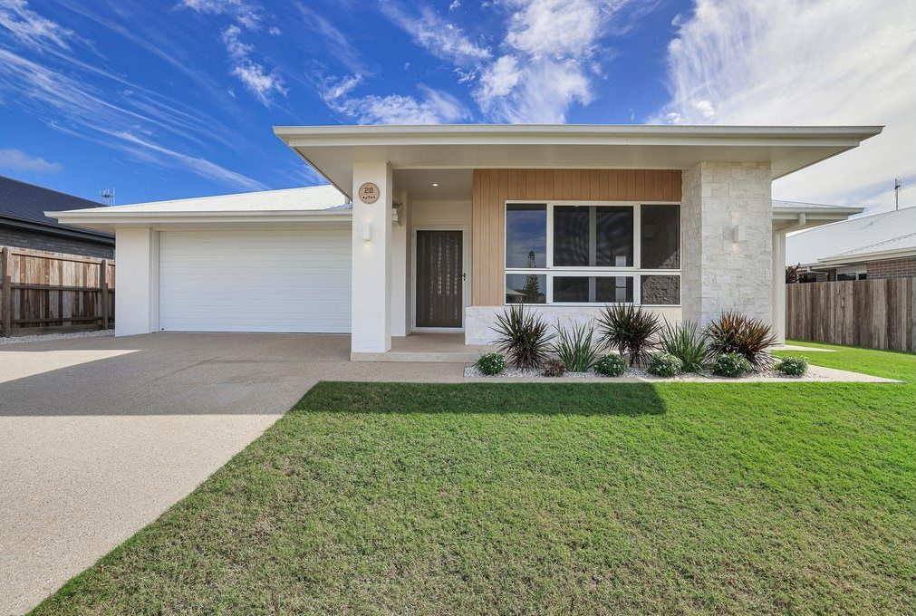 Modern Single-story House With a White Facade, and Attached Garage — Master Cabinets Bundaberg in Kensington, QLD