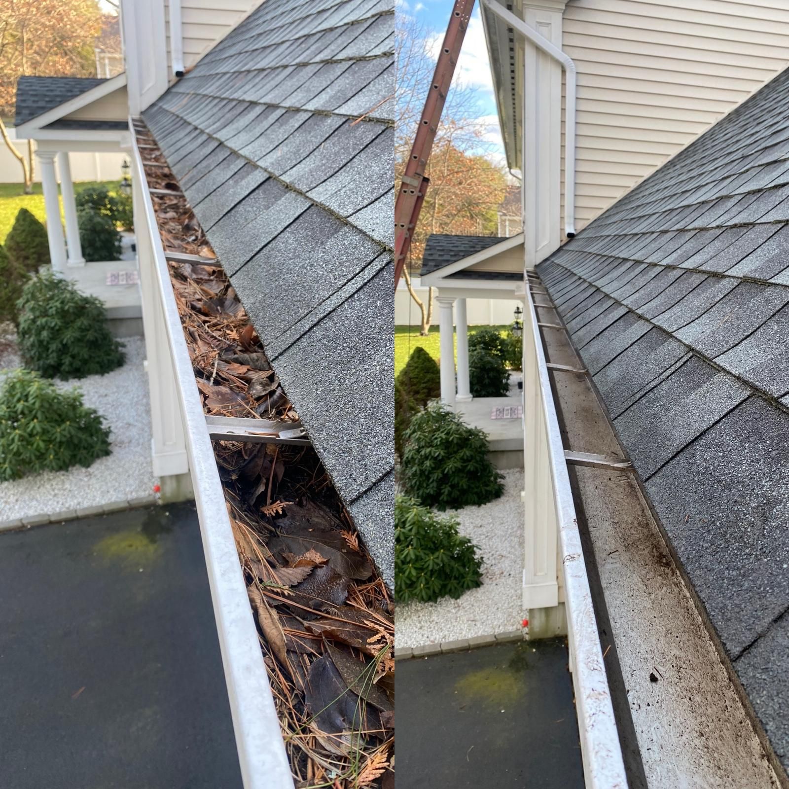 A gutter is sitting on top of a roof next to a deck.