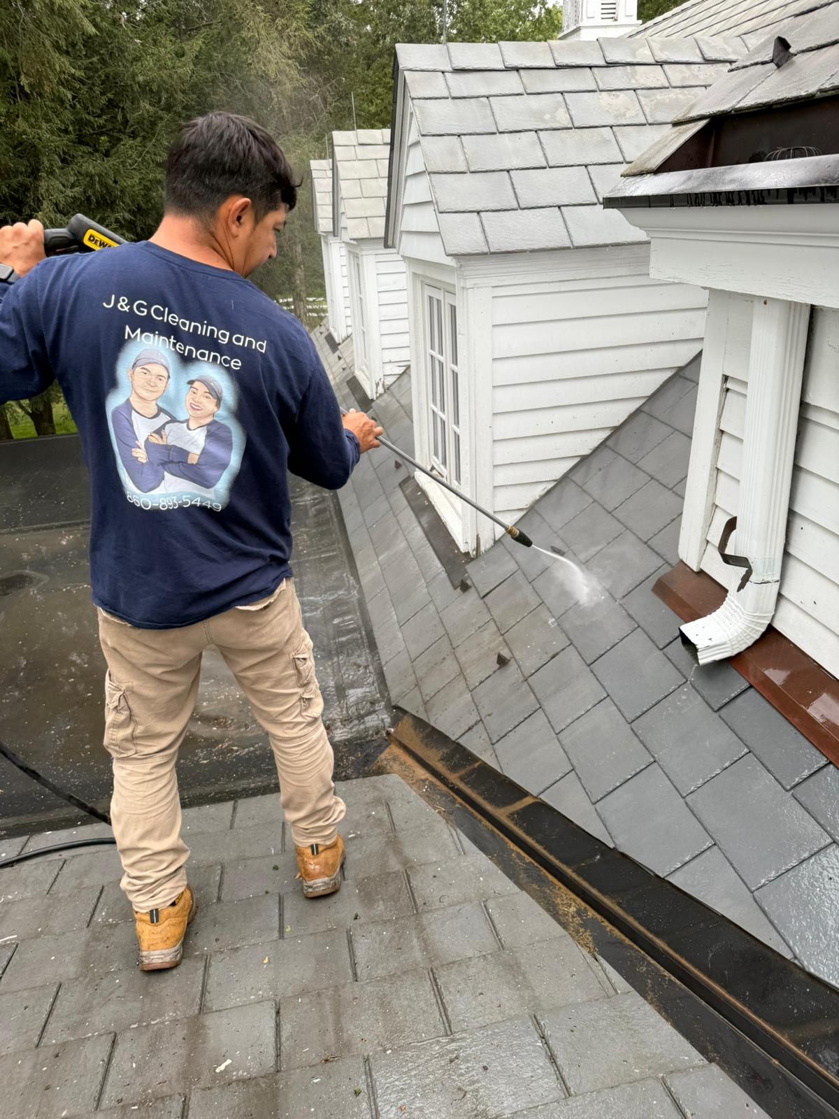 Roof washing with power washer in Southington CT by J & G Cleaning