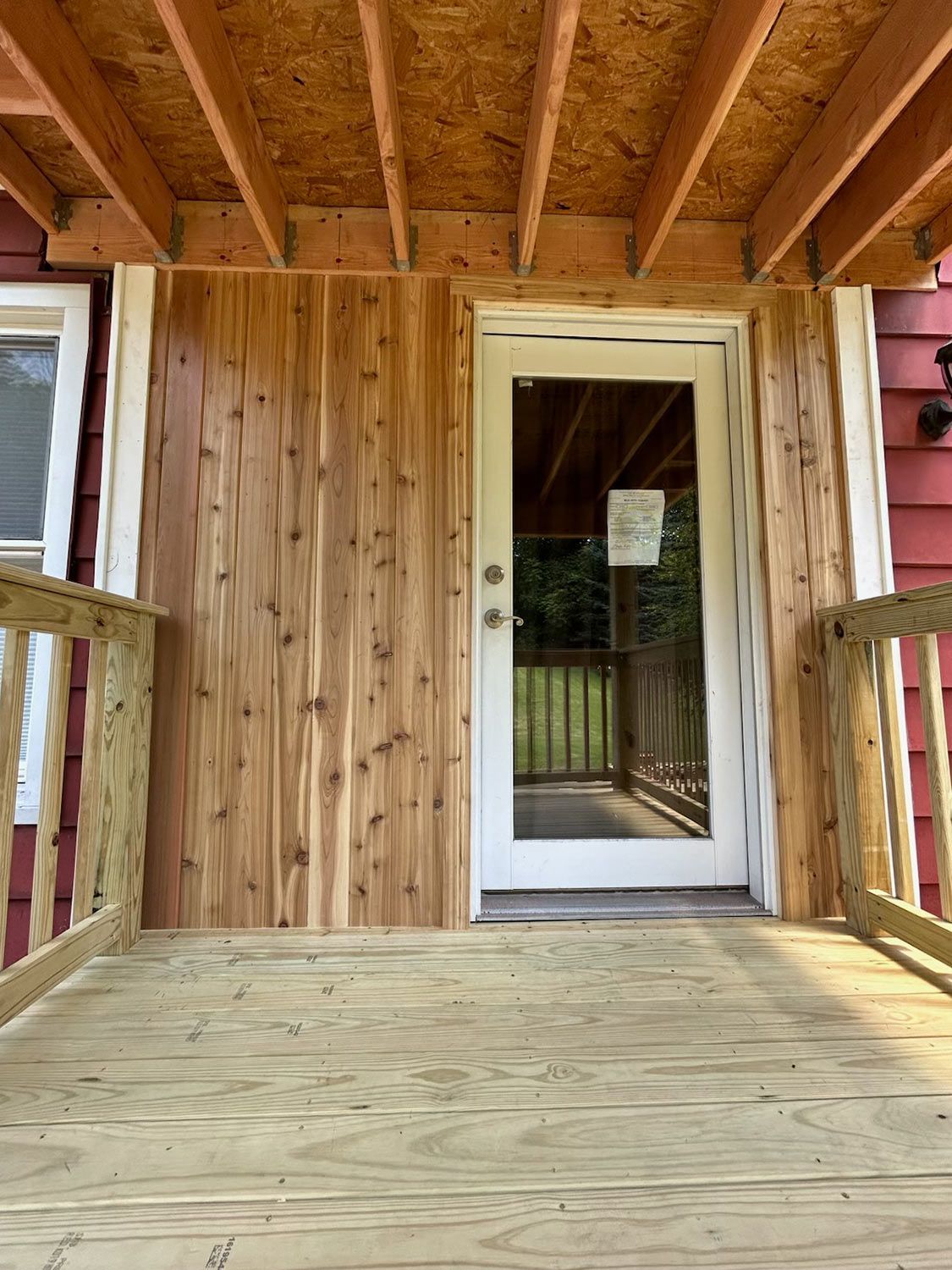 White Door and Wooden Siding