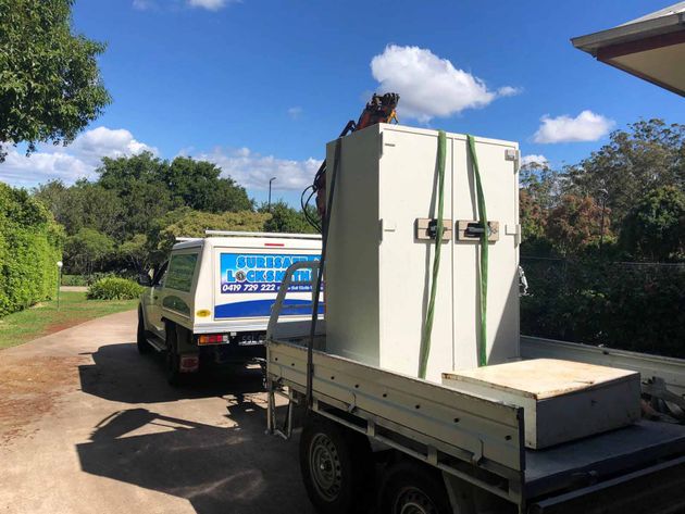 Mobile locksmith towing a large safe in a trailer in Toowoomba