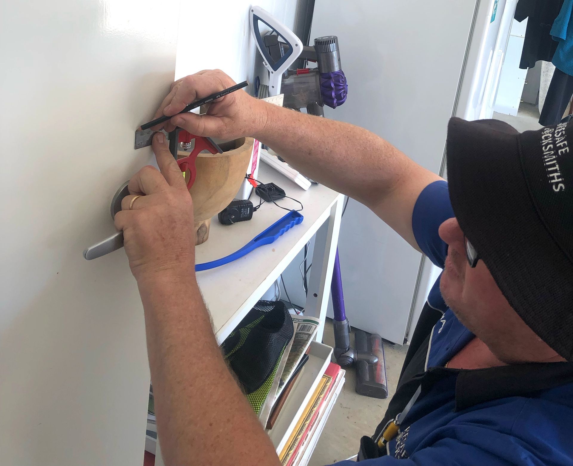 Locksmith Installing Door Lock — Locksmith in Toowoomba South, QLD