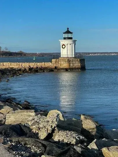Chimney-Sweep-Portland
A lighthouse is in the middle of a body of water.