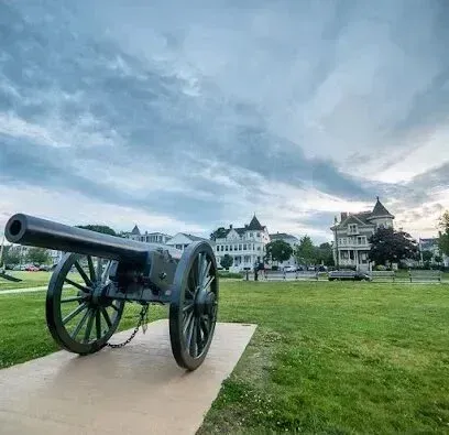 Chimney-Sweep-Portland-An old cannon is sitting in the middle of a grassy field.