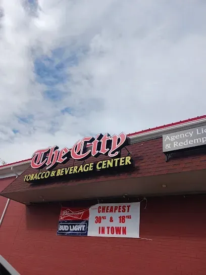 Exterior sign of The City Tobacco and Beverage Center storefront