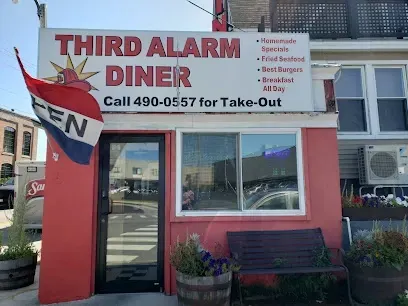 Exterior of Third Alarm Diner with storefront sign and entrance