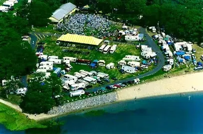 Aerial view of Thomas Point Beach and Campground with RVs along the shoreline
