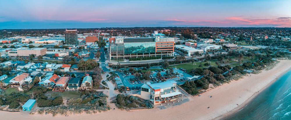 Aerial View Of A Coastal Town With Buildings, Roads And Beach — NJP Services In Frankston, VIC