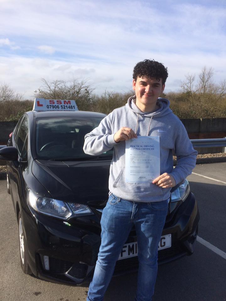 A man passing the driving test