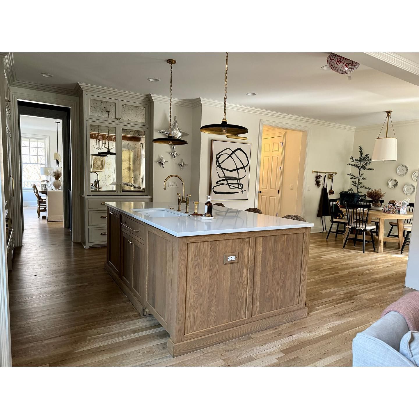 A kitchen with a large island in the middle of the room.