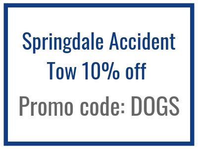 Springdale accident tow service advertisement: 10% off. Promo code DOGS, blue frame.