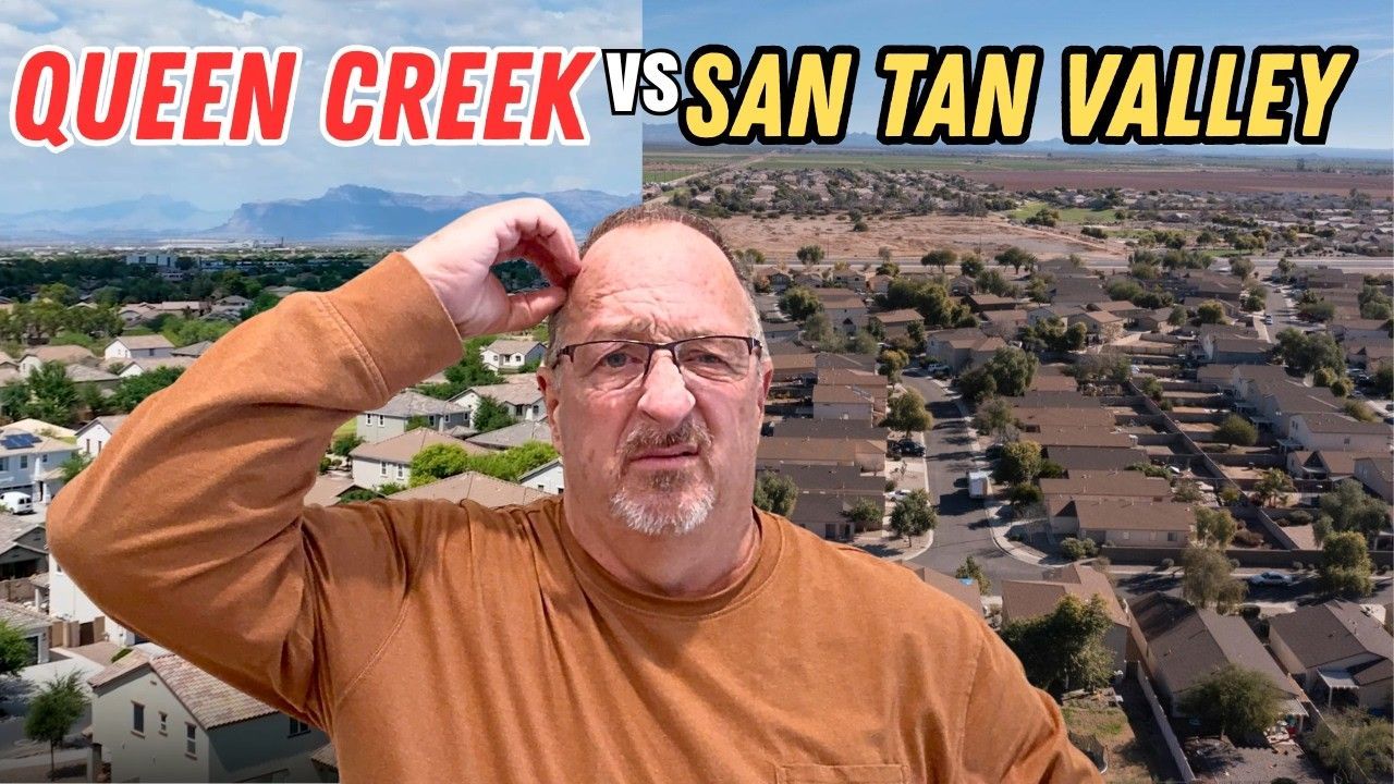 A man wearing glasses and an orange shirt poses in front of an aerial view of a suburban neighborhood.