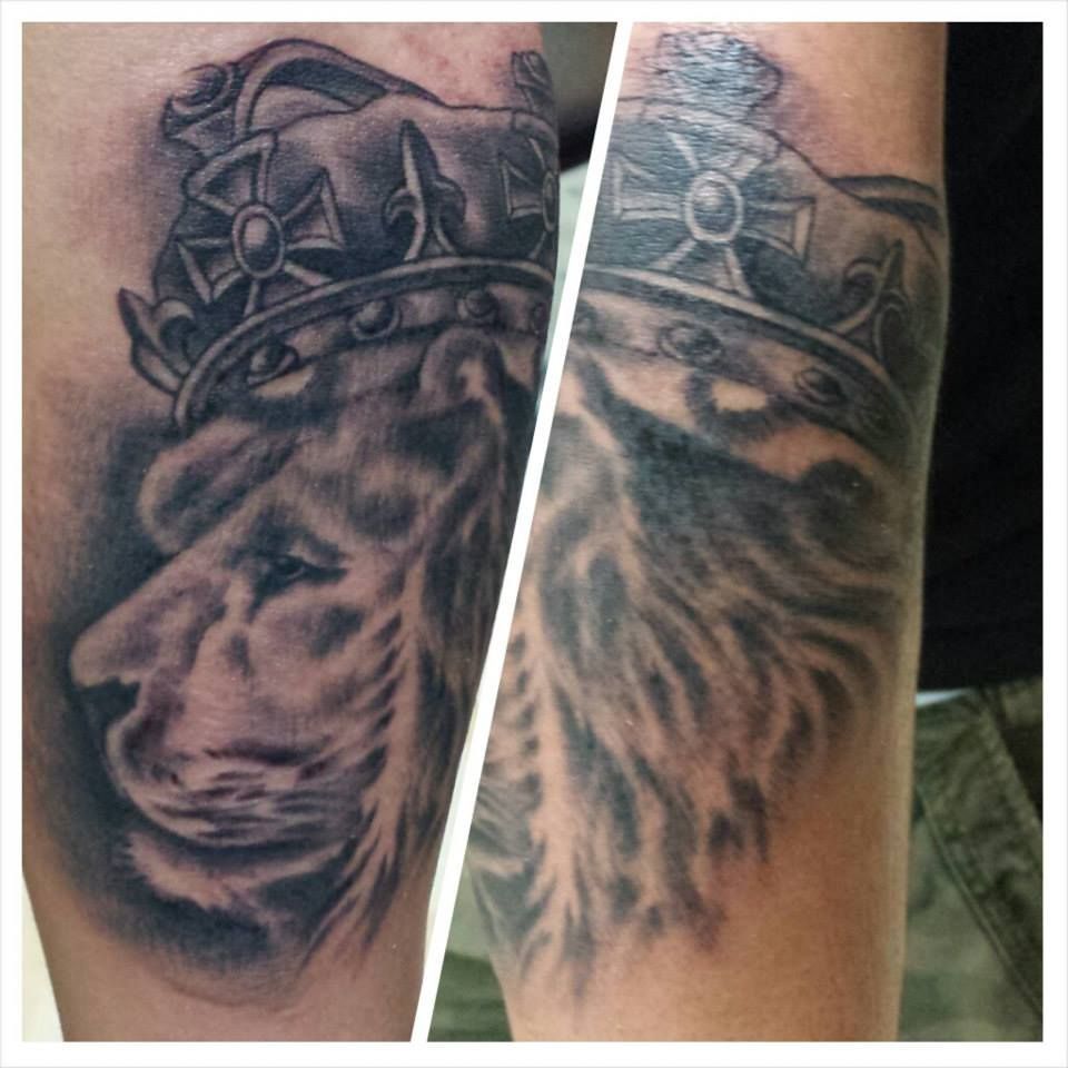 Two-part tattoo featuring a lion wearing a crown in a grayscale design.