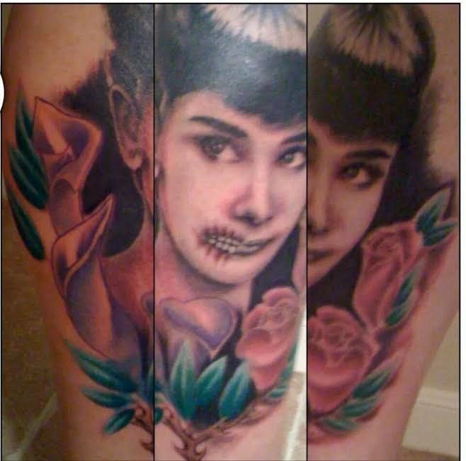 Audrey Hepburn tattoo with flowers, stitches on the mouth, dark background.