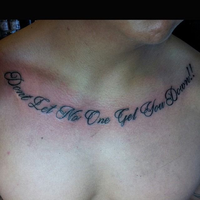 Tattoo across chest reads 