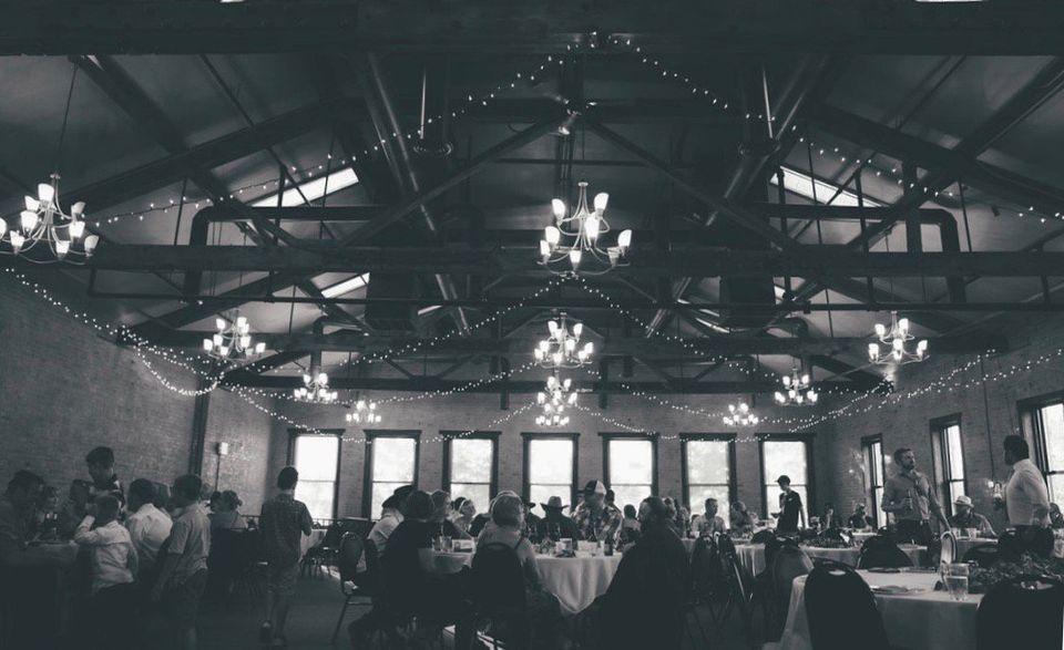Reception Venue —  Wedding Party Tossing Petals on Bride and Groom Pueblo, CO