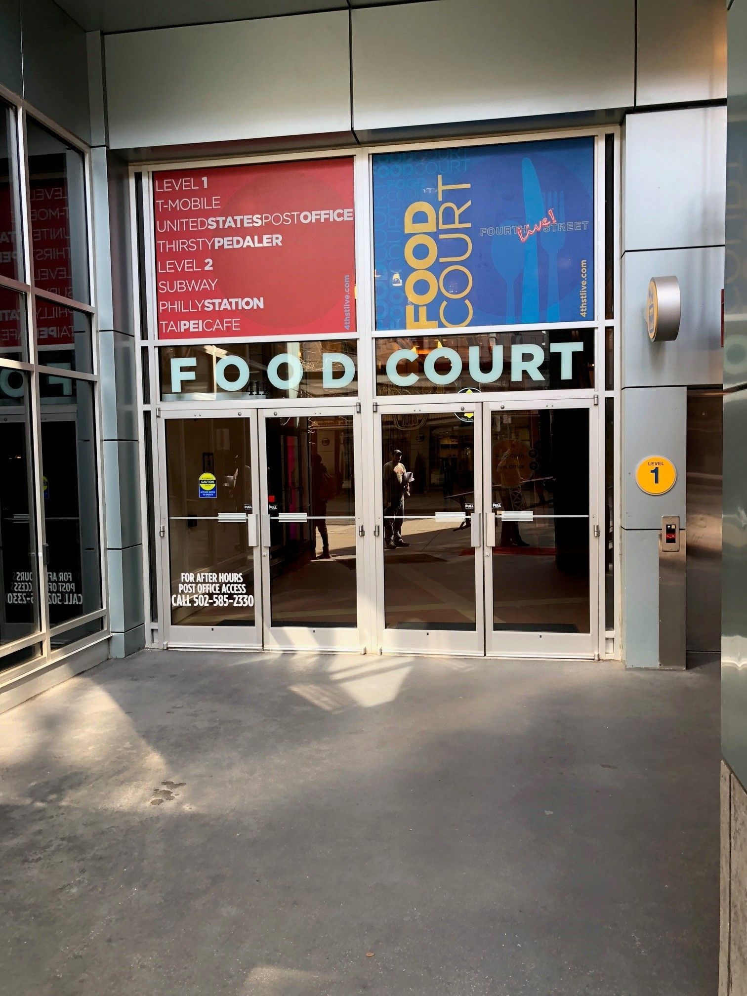 A building with a sign that says food court on it