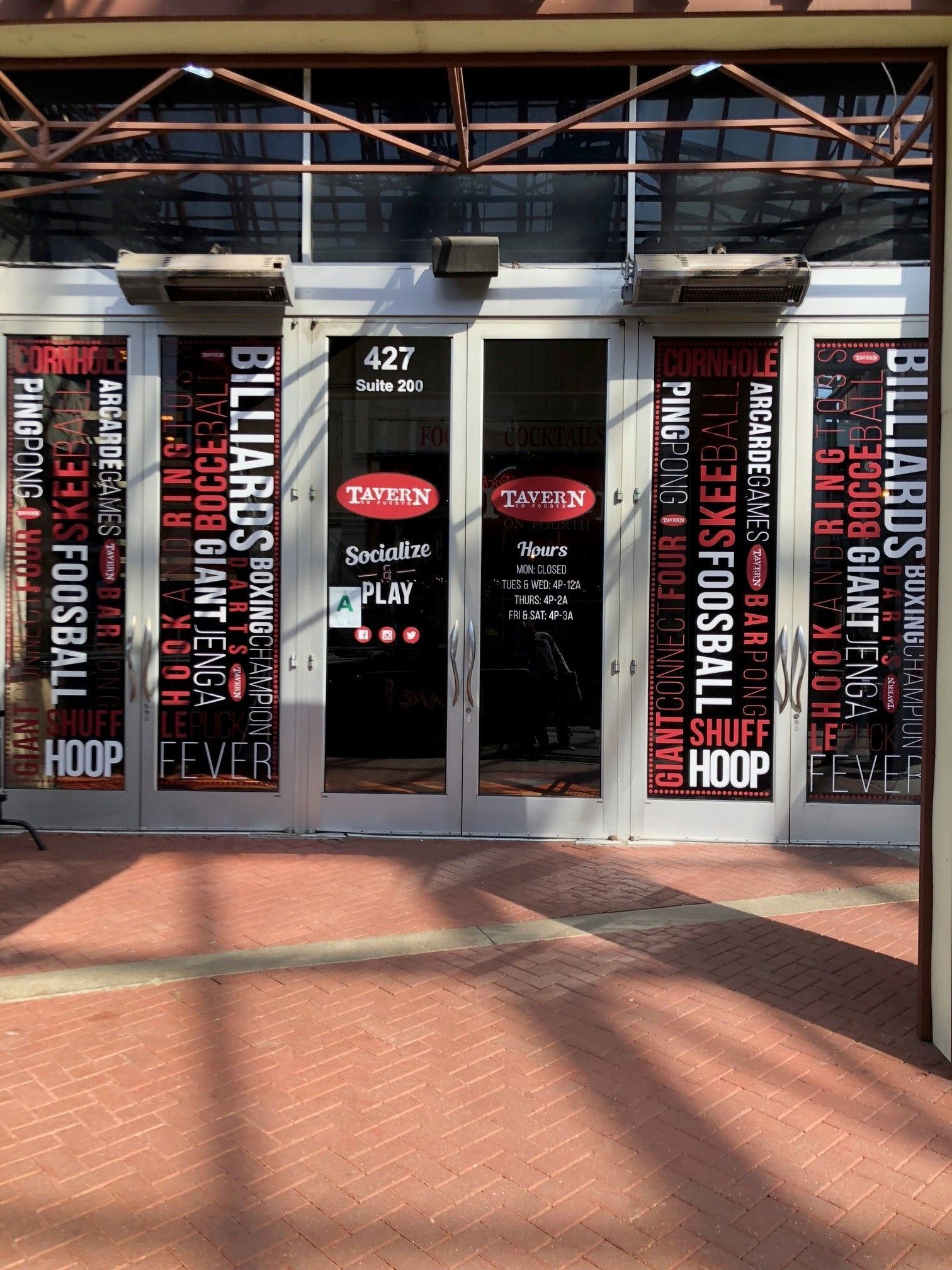 A building with a sign that says ' billiards ' on it