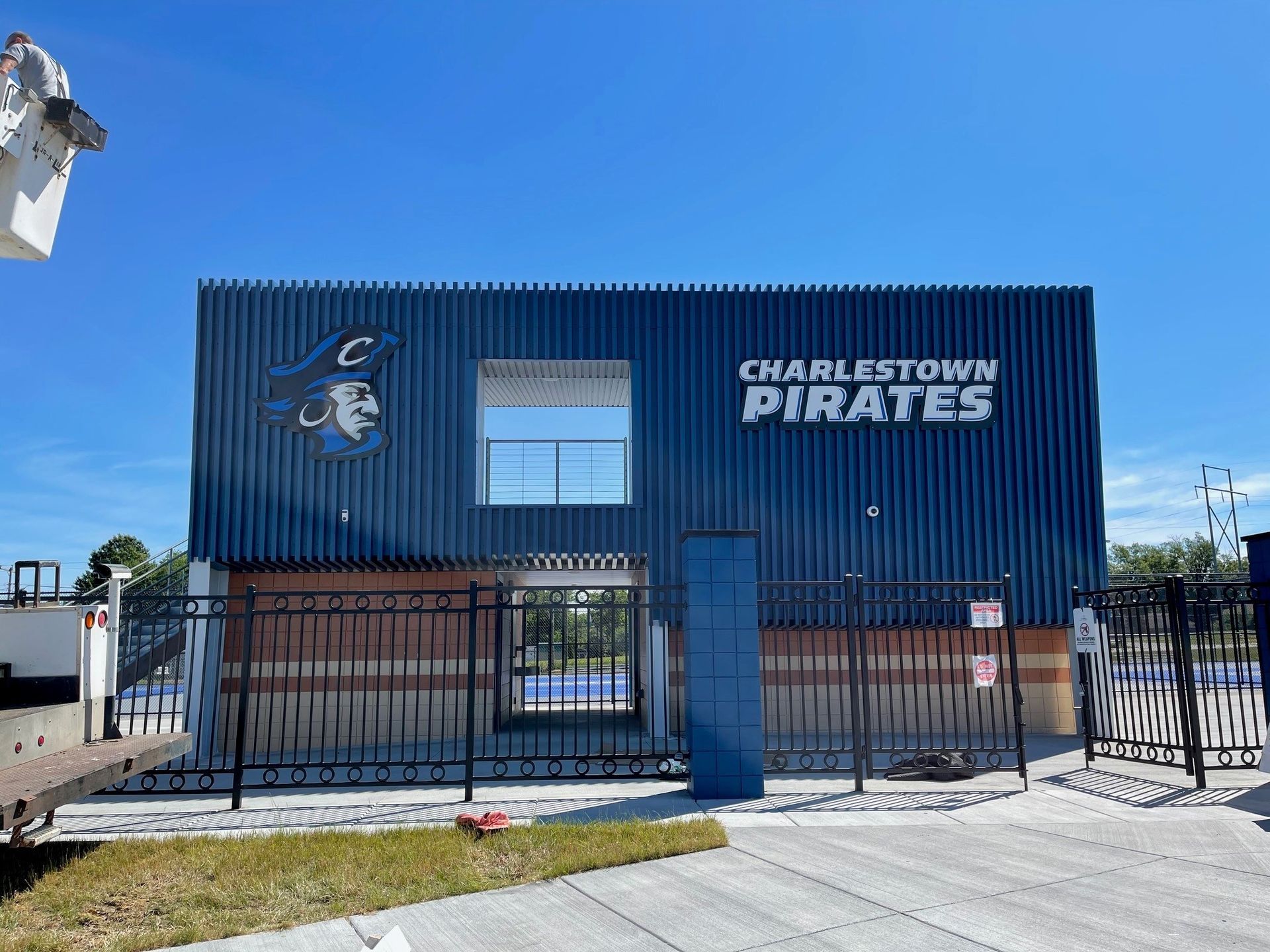 A building with a sign that says charlestown pirates on it.