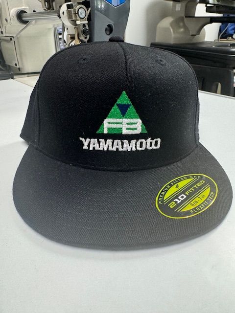 A black hat with yamamoto embroidered on it